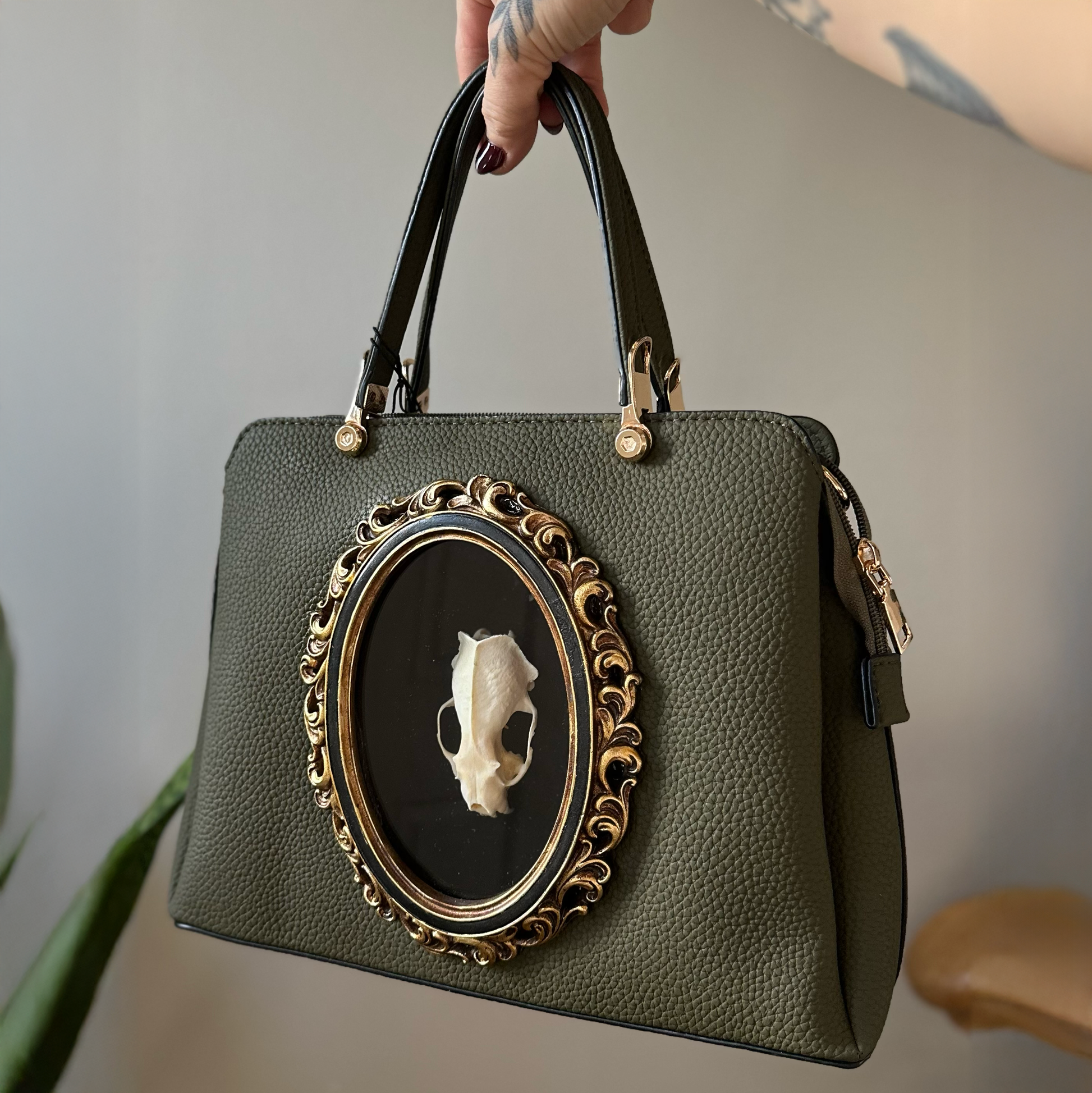 Peacock leather handbag