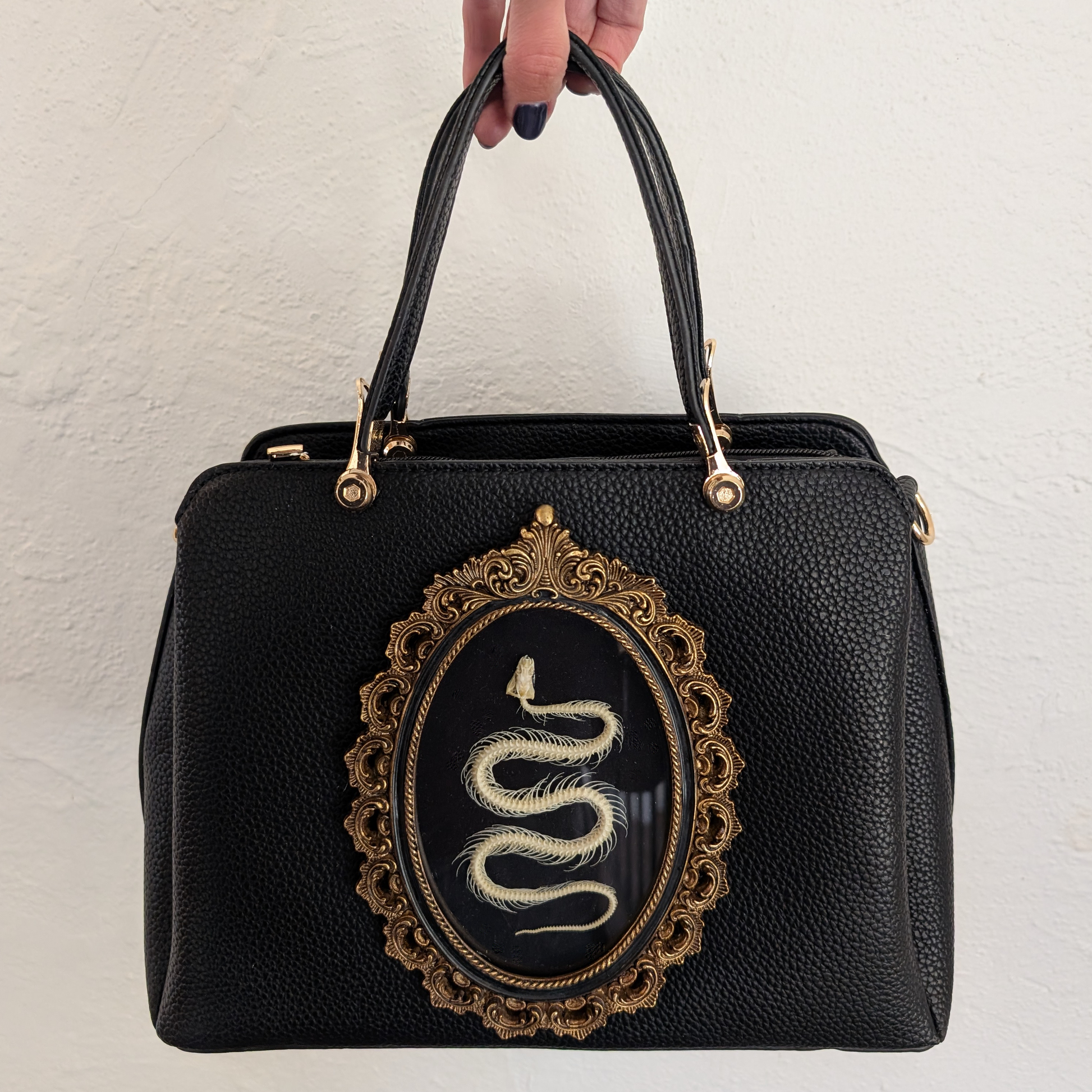 Peacock leather handbag